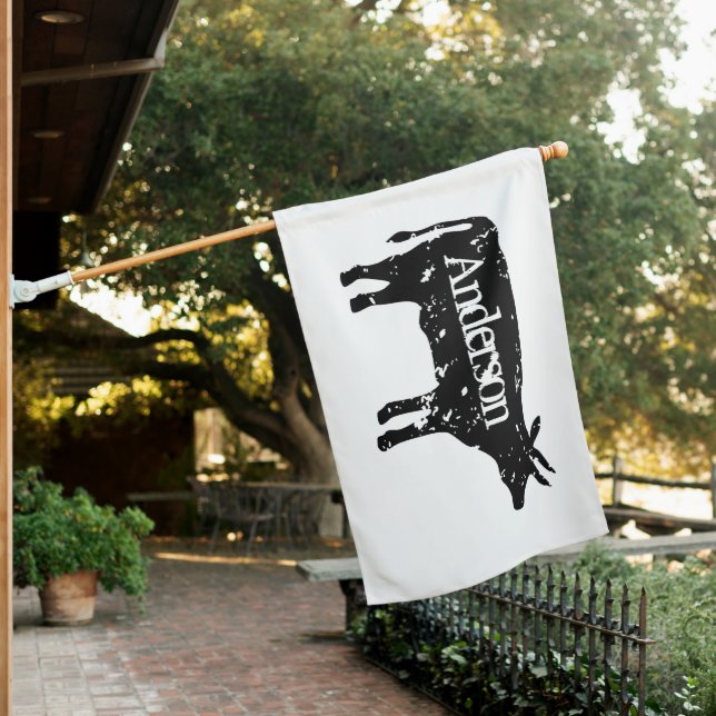 Black cow silhouette custom pole flag (In SItu)