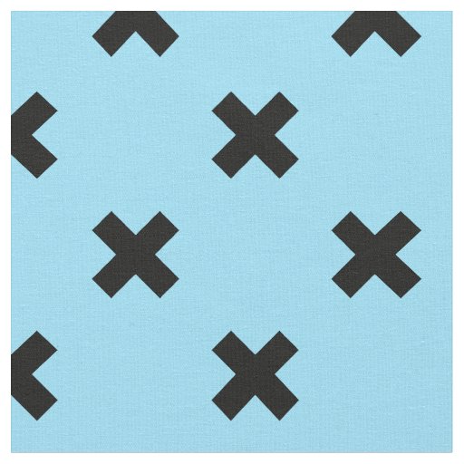Black cross stitches on baby blue fabric