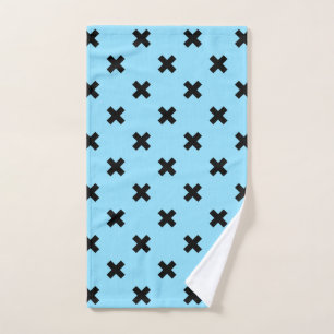 Black cross stitches on baby blue hand towel 