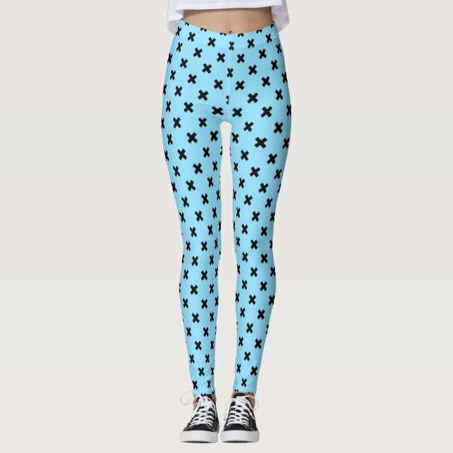 Black cross stitches on baby blue leggings (Front)