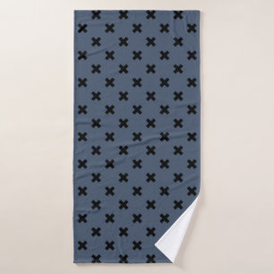 Black cross stitches on blue-gray bath towel