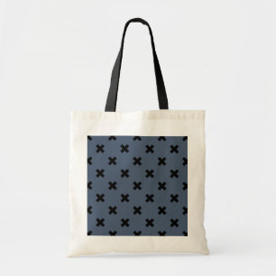 Black cross stitches on blue-grey tote bag