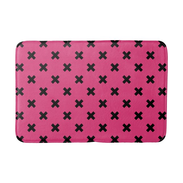 Black cross stitches on fuchsia bath mat (Front)