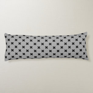 Black cross stitches on gray body pillow