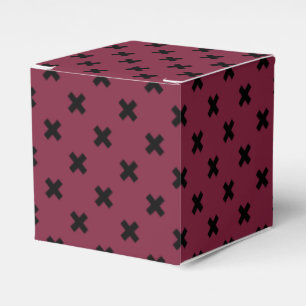 Black cross stitches on mulberry favor boxes