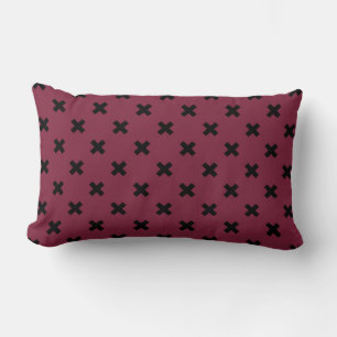 Black cross stitches on mulberry lumbar pillow