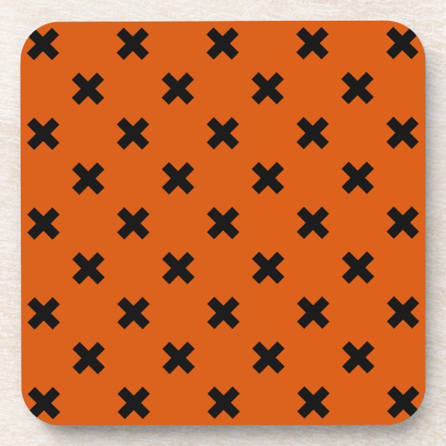 Black cross stitches on orange beverage coaster (Front)