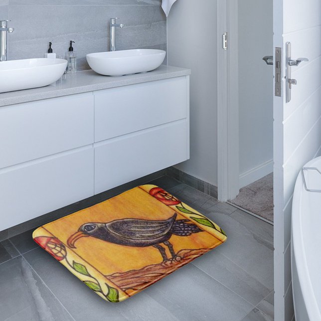 Black Crow Art Deco Roses Folk Art Bathroom Mat (Black crow on branch with red flowers on stem on golden yellow bath rug.)
