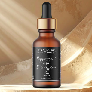 Black curly text cosmetics dropper bottle label