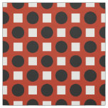 Black dots and white squares on red fabric