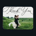 Black Elegant Handwritten Script Photo Wedding Magnet<br><div class="desc">Celebrate your love and show gratitude with our customizable photo wedding thank you magnet! This unique keepsake is perfect for reminding your loved ones of your special day while expressing your heartfelt thanks in a memorable way. It features an elegant white script. Personalize by adding your photo and details. This...</div>