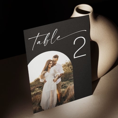 Black elegant minimalist script arch photo wedding table number