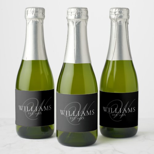 Black Elegant Script Monogram Last Name Sparkling Wine Label