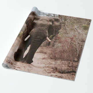 BLACK ELEPHANT WALKING ON BROWN SAND WRAPPING PAPER