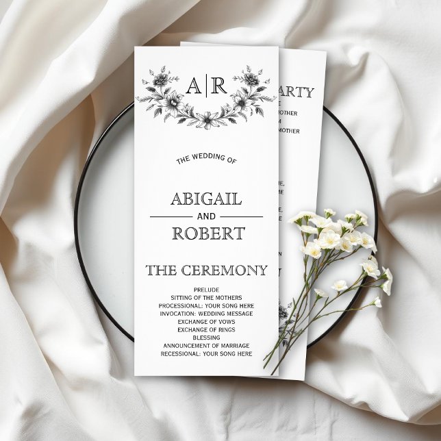 Black floral frame with monogram wedding program (Creator Uploaded)