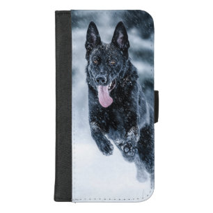 Black German Shepherd in snow Duvet Cover