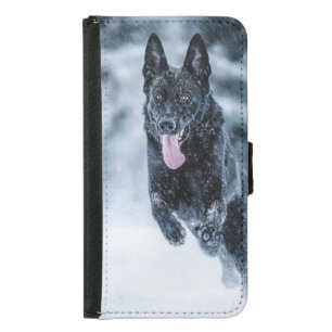 Black German Shepherd in snow Duvet Cover