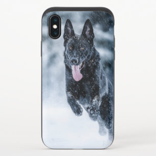 Black German Shepherd in snow Duvet Cover