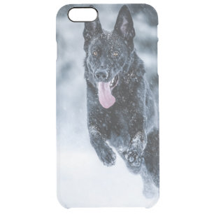 Black German Shepherd in snow Duvet Cover