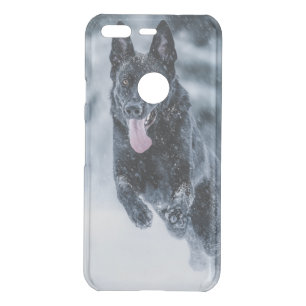 Black German Shepherd in snow Duvet Cover