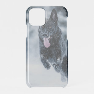 Black German Shepherd in snow Duvet Cover