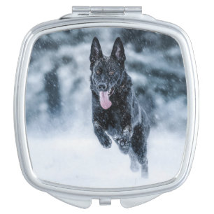 Black German Shepherd in snow Duvet Cover Compact Mirror