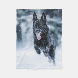 Black German Shepherd in snow Duvet Cover Fleece Blanket