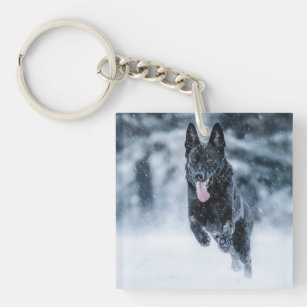 Black German Shepherd in snow Duvet Cover Keychain