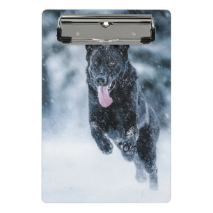 Black German Shepherd in snow Duvet Cover Mini Clipboard