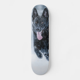 Black German Shepherd in snow Duvet Cover Skateboard
