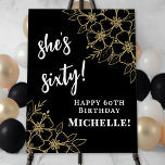 Black Gold 60th Birthday Party Welcome Foam Board<br><div class="desc">Elegant 60th Birthday Vertical Sign: Celebrate sixty wonderful years with this elegant birthday sign, designed in a vertical layout for a modern and eye-catching display. The black background is accented with gold watercolor florals placed in the top right and bottom left corners, adding a sophisticated botanical touch. The design uses...</div>