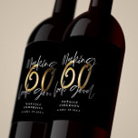 Black gold 60th birthday typography party favor  wine label<br><div class="desc">Celebrate your 60th birthday in style with these black,  white and gold effect 60th birthday party decor wine labels. A modern design with script text and bold grahics. Change the colour to customise. Part of a collection.</div>
