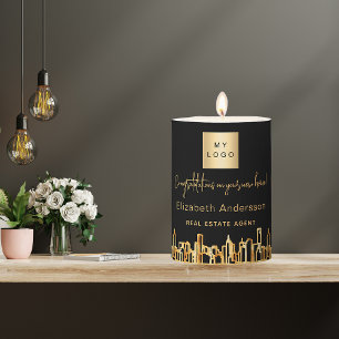 Black gold city skyline real estate agent logo pillar candle