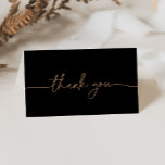 Black Gold Classic Folded Wedding Thank You Card<br><div class="desc">This black gold classic folded wedding thank you card is perfect for a modern wedding. The simple and elegant design features classic and fancy script typography in gold. Personalize the inside of the card with your names, and a thank you message. Or, leave the thank you message section blank and...</div>