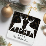 Black & Gold Confetti Reindeer Joy Family Photo Ceramic Ornament<br><div class="desc">Modern festive black,  white and gold confetti ornament. Our design features a modern black and gold confetti background with a two white reindeer animal designs. Customize family signature and year. The reverse side features a place to add your own family photo along with your name. Design by Moodthology Papery</div>