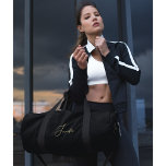 Black Gold Elegant Monogrammed Gym Sports Travel Duffle Bag<br><div class="desc">Create your own custom, personalized, elegant faux gold script / typography monogram monogrammed, lightweight, durable Polyester Poplin, men women solid jet black travel gym sports carry-on duffle bag, with rugged 22" carry handles, removable and adjustable (27" to 48") shoulder strap with shoulder pad and metal swivel hooks, laminate lining with...</div>