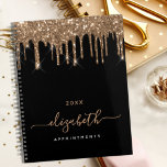 Black gold glitter drips monogram name 2025 planner<br><div class="desc">An elegant black background with faux gold glitter drips, paint dripping look. Personalize and add a year, name and a title. The name is written with a golden large modern hand lettered style script. Perfect for school, work or organizing your personal/family life. To keep the swashes only delete the sample...</div>