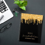 Black gold glitter drips monogram planner<br><div class="desc">A chic black background with trendy faux gold glitter drips, paint dripping look. Personalize and add a year, name and a title. The name is written with a modern hand lettered style script with swashes. Perfect for school, work or organizing your personal/family life. To keep the swashes only delete the...</div>