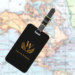 Black gold laurel wreath monogram initials name luggage tag<br><div class="desc">A classic black background. Golden colored letters. Personalize and add your family monogram initial and name,  your contact information on the back. For both him and her.</div>