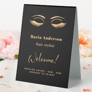 Black gold makeup artist opening hours welcome table tent