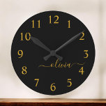 Black Gold Modern Script Girly Monogram Name Round Clock<br><div class="desc">Black and Gold Simple Script Monogram Name Clock. This makes the perfect sweet 16 birthday,  wedding,  bridal shower,  anniversary,  baby shower or bachelorette party gift for someone that loves glam luxury and chic styles.</div>