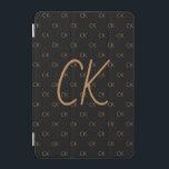 Black gold monogram initials script modern iPad mini cover<br><div class="desc">Personalize and add your monogram letters,  initials,   The monogram initials as a pattern on the background.   A classic chic black background color.  Golden colored letters.</div>