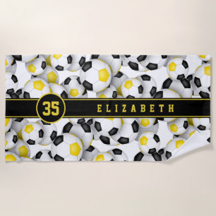 Black gold team colors soccer balls pattern kids beach towel