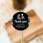 Black Gothic Halloween Skeleton Bridal Shower Classic Round Sticker<br><div class="desc">Add a touch of spooky elegance to your bridal shower with our Black Gothic Halloween Skeleton Bridal Shower Square Stickers! Featuring a dark, gothic design with floral accents and haunting skeleton motifs, these stickers are perfect for sealing envelopes, decorating favors, or adding a unique gothic flair to your Halloween-themed bridal...</div>