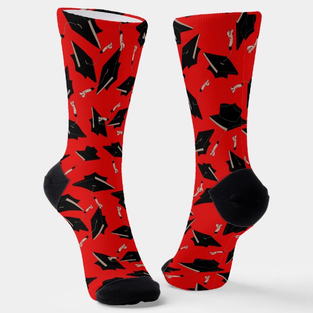 Black Graduation Caps Tossed in the Air on Red Socks (Angled)