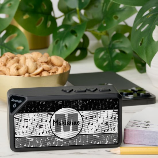 Black gray and white music notes bluetooth speaker