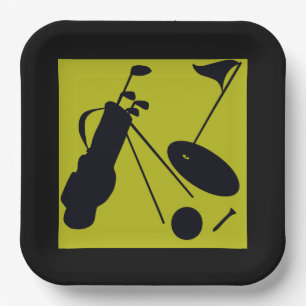 Black & green golf tee, clubs , golf balls paper plates