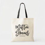 Black Hand Lettering Matron of Honour Tote Bag<br><div class="desc">Modern and classic tote bag featuring black MATRON OF HONOUR hand lettering script. Personalize by adding the receivers name or the hashtag of the wedding. Perfect as a gift for your wedding party or bridal party.</div>