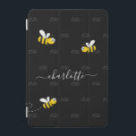 Black happy bumble bees summer fun humor monogram iPad mini cover<br><div class="desc">Decorated with happy, smiling yellow and black bumble bees. A chic black background. Personalize and add a name and your monogram, initials. The monogram in gray as a pattern in the background. The name is written in white with a modern hand lettered stylie script with swashes. To keep the swashes...</div>