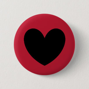 Black heart on red pinback button